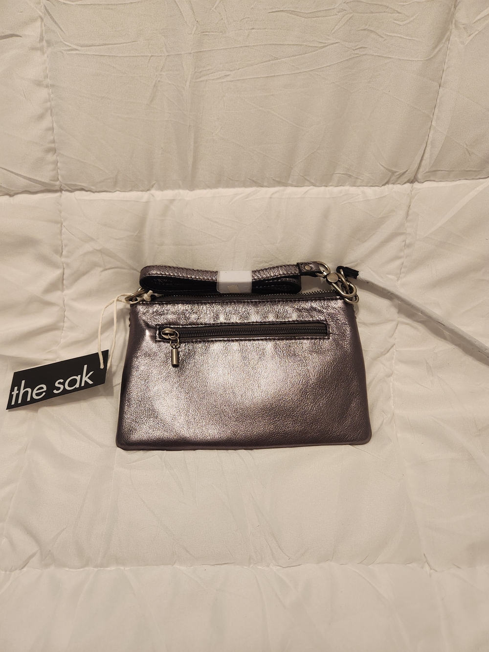 The Sak Metallic Gun Metal Leather Crossbody Wristlet